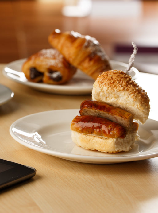 Breakfast options for meetings at Mercure hotels. Coffee, pastries and a sausage bap.