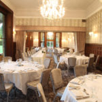 The William Morris Suite at Mercure Burton Upon Trent Newton Park Hotel, set up for a wedding breakfast